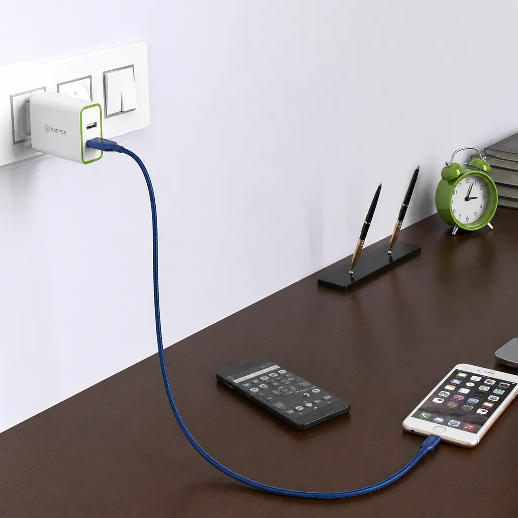 Cadyce CA-DUWC 30W Dual USB Wall Charger in home setup charging a smartphone with Quick Charge 3.0 and Smart Charging
