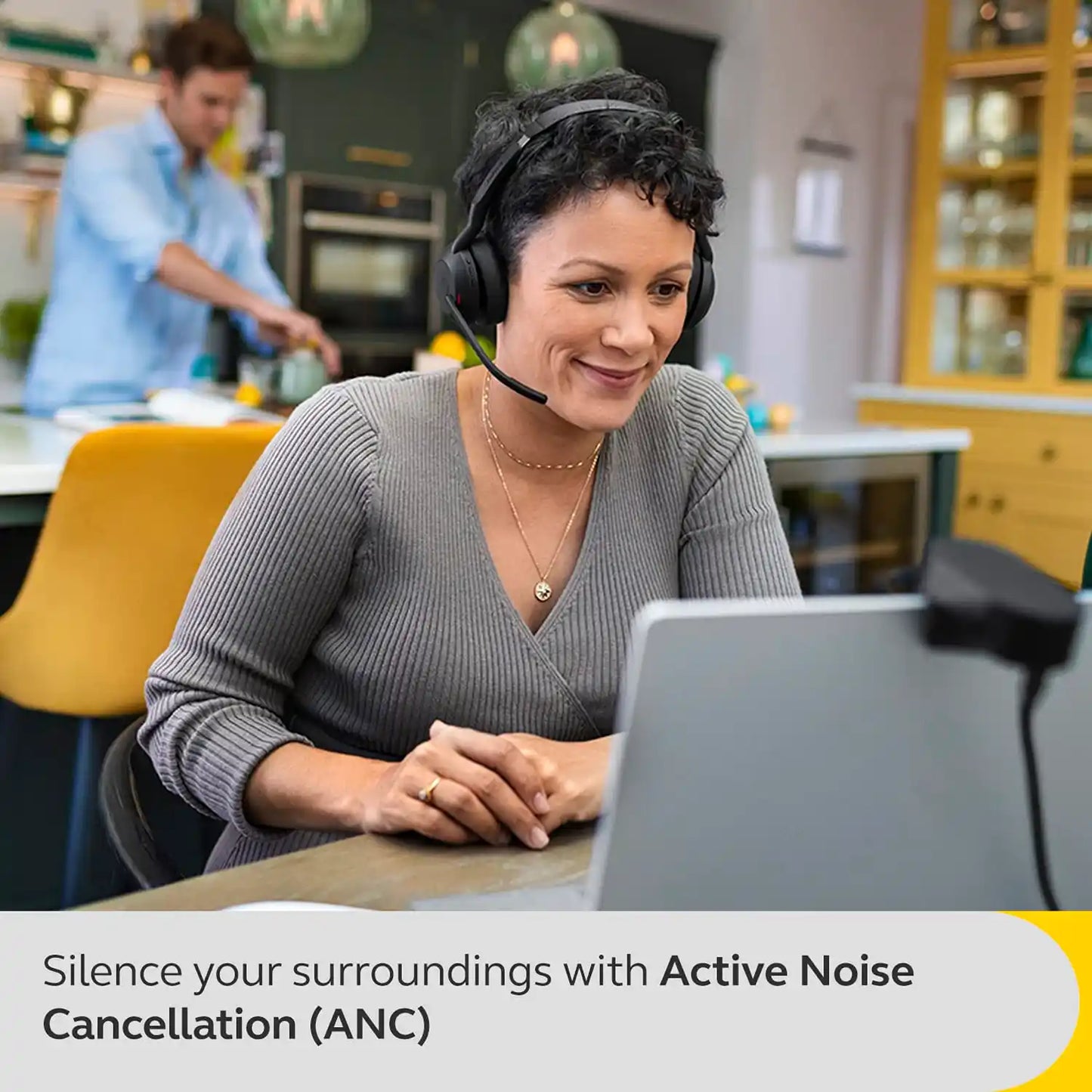 Professional using Jabra Evolve2 55 MS Stereo Headset with Active Noise Cancellation ANC during a virtual meeting -tpstech.in