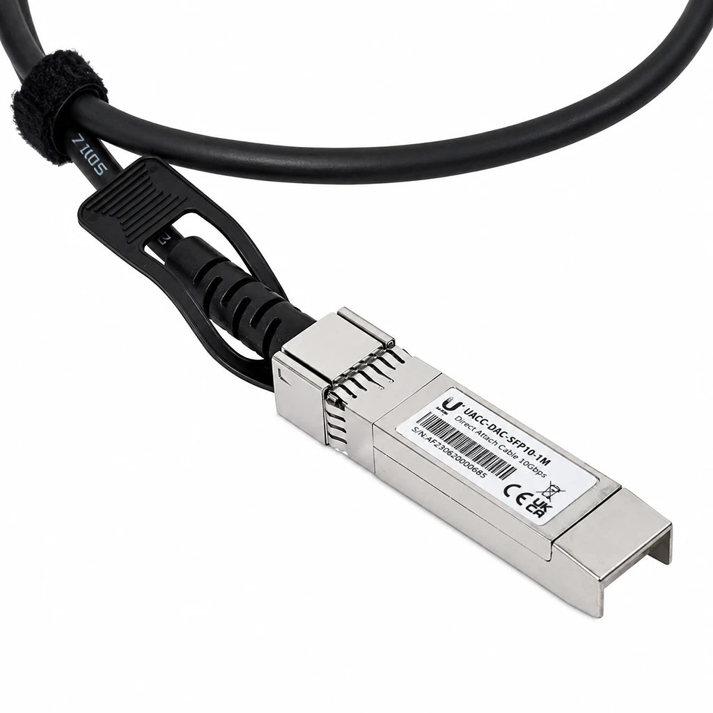 Detailed close-up of Ubiquiti UniFi UACC-DAC-SFP10-1M 10G SFP+ Direct Attach Copper Cable connector with product label -tpstech.in