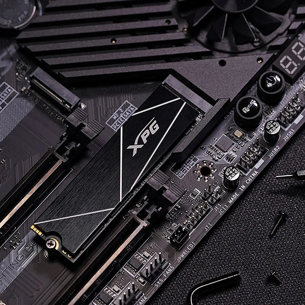 XPG GAMMIX S70 Blade 8TB PCIe Gen4 NVMe M.2 2280 SSD securely mounted in an M.2 slot on a desktop motherboard.