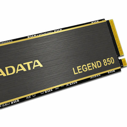Close-up of ADATA Legend 850 512GB PCIe Gen4 NVMe M.2 2280 Internal Gaming SSD highlighting brushed aluminum heatsink, gold connector, and LEGEND 850 branding.