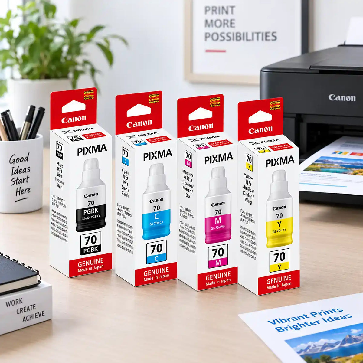 Canon GI-70 Original Ink Bottle Bundle Retail Boxes on Office Desk Beside PIXMA Printer -tpstech.in