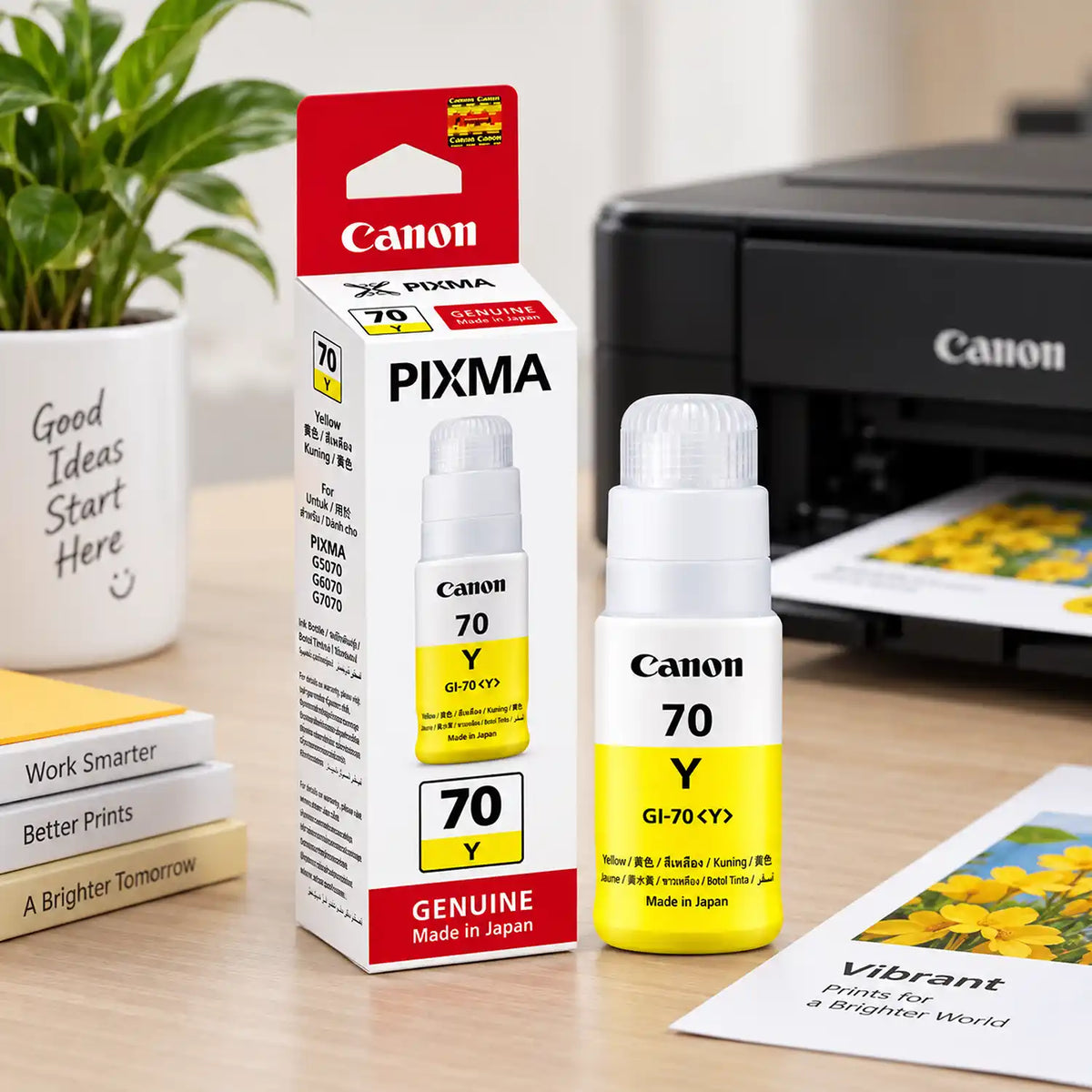 Canon GI-70 Yellow Original Ink Bottle and Packaging Box on Desk Setup with PIXMA Printer -tpstech.in