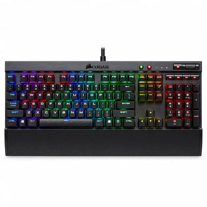 Corsair K70 LUX RGB Mechanical Gaming Keyboard top down view with vibrant multicolor RGB backlighting and wrist rest tpstech.in