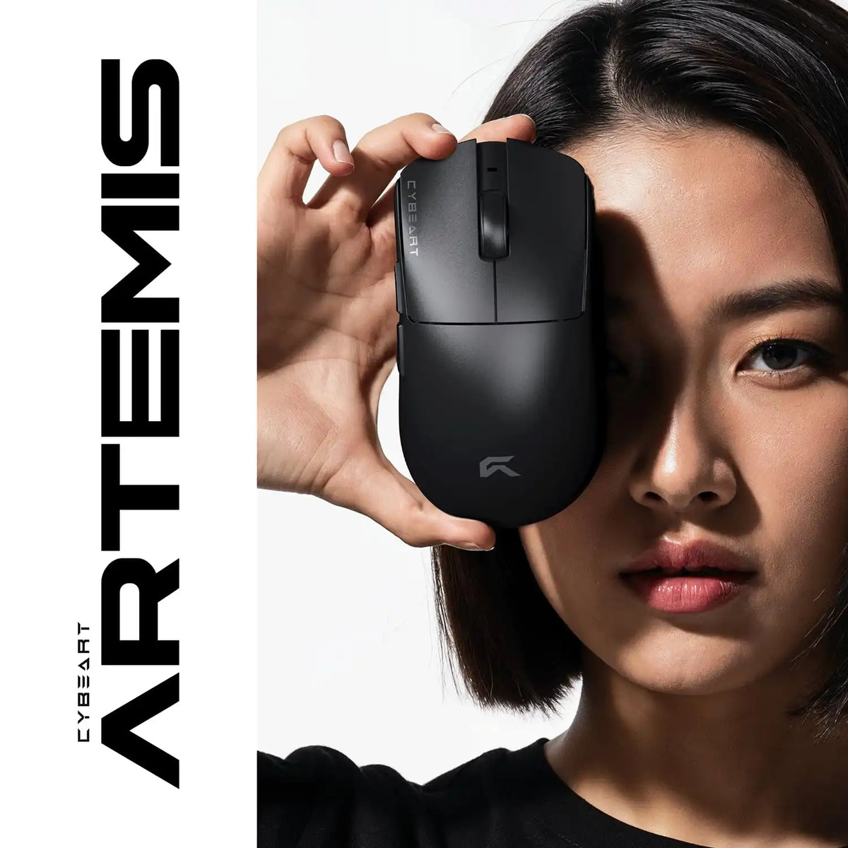 Female gamer holding Cybeart Artemis 52g Ultra-Light Wireless Gaming Mouse showcasing compact form factor -tpstech.in