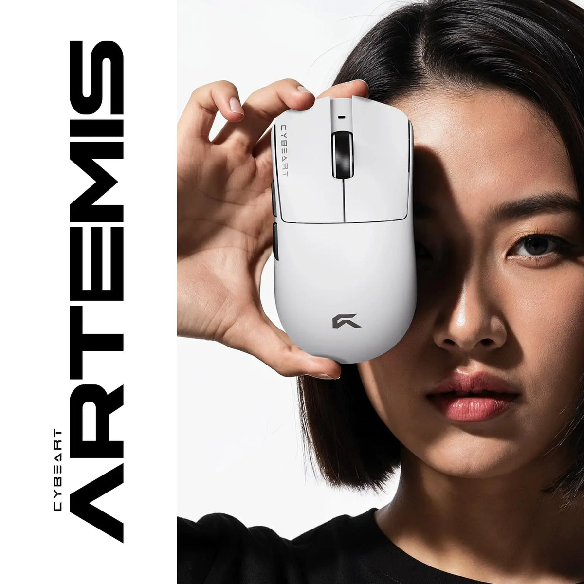 Female gamer holding Cybeart Artemis 52g Ultra-Light Wireless Gaming Mouse - White showcasing compact size and ergonomics -tpstech.in