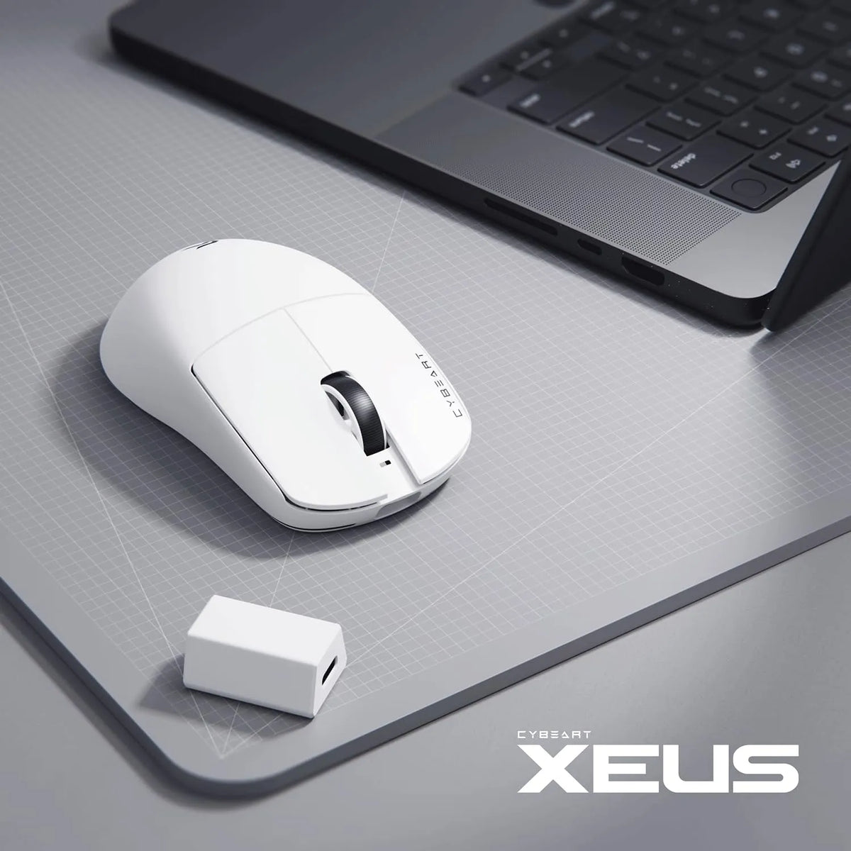 Cybeart Xeus Ultra-Light Wireless Gaming Mouse (White) beside a sleek laptop with white 8K dongle receiver -tpstech.in