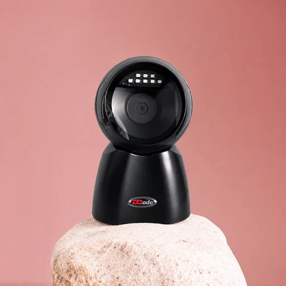 Dcode DC7132 tabletop barcode scanner displayed for retail POS, supermarket checkout, and billing counter applications.