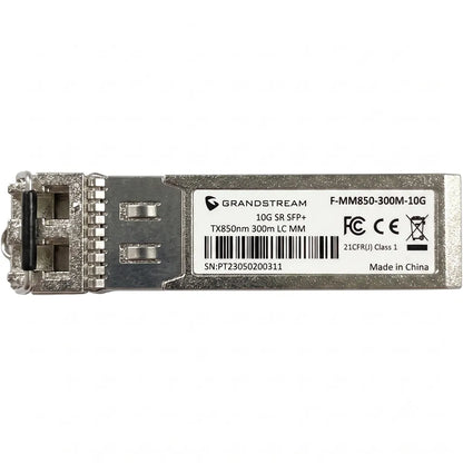 Top view of Grandstream F-MM850-300M-10G 10Gb SFP+ multi-mode fiber module with product label visible.