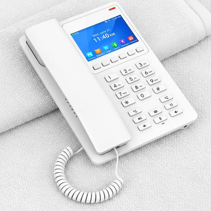 Grandstream GHP630 hotel IP phone with color LCD placed in a hospitality room environment