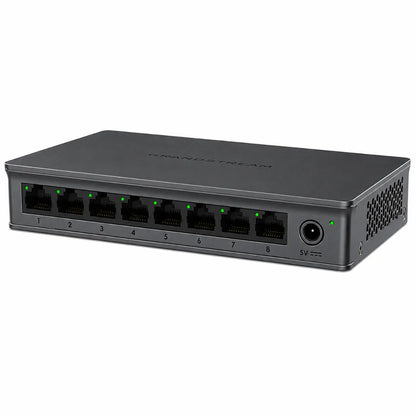Right angle view of Grandstream GWN7701 unmanaged Gigabit Ethernet switch featuring eight RJ45 ports and compact desktop design.