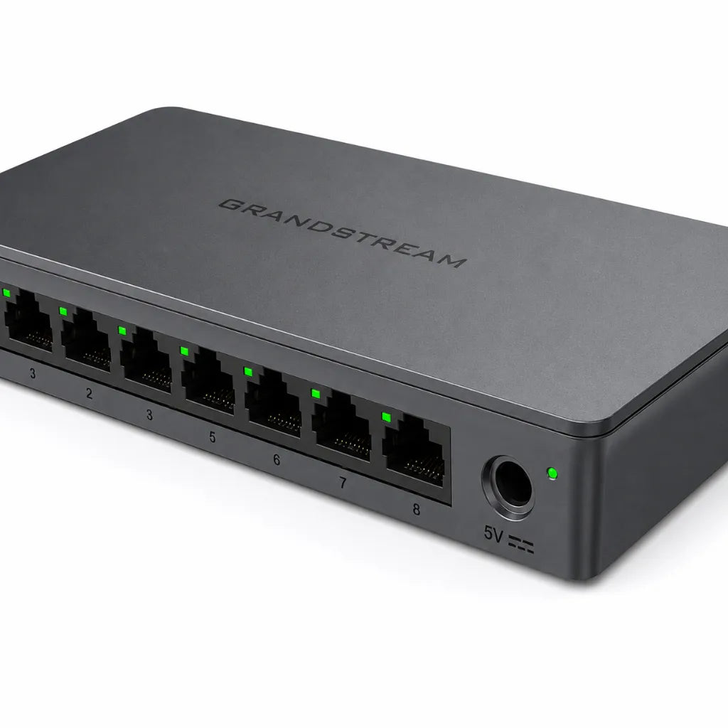 Close-up of Grandstream GWN7711 managed Gigabit switch showing RJ45 Ethernet ports and power input.