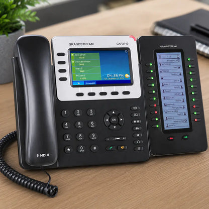 Grandstream GXP2200 EXT business phone expansion module paired with GXP2140 desk phone for enterprise communication.