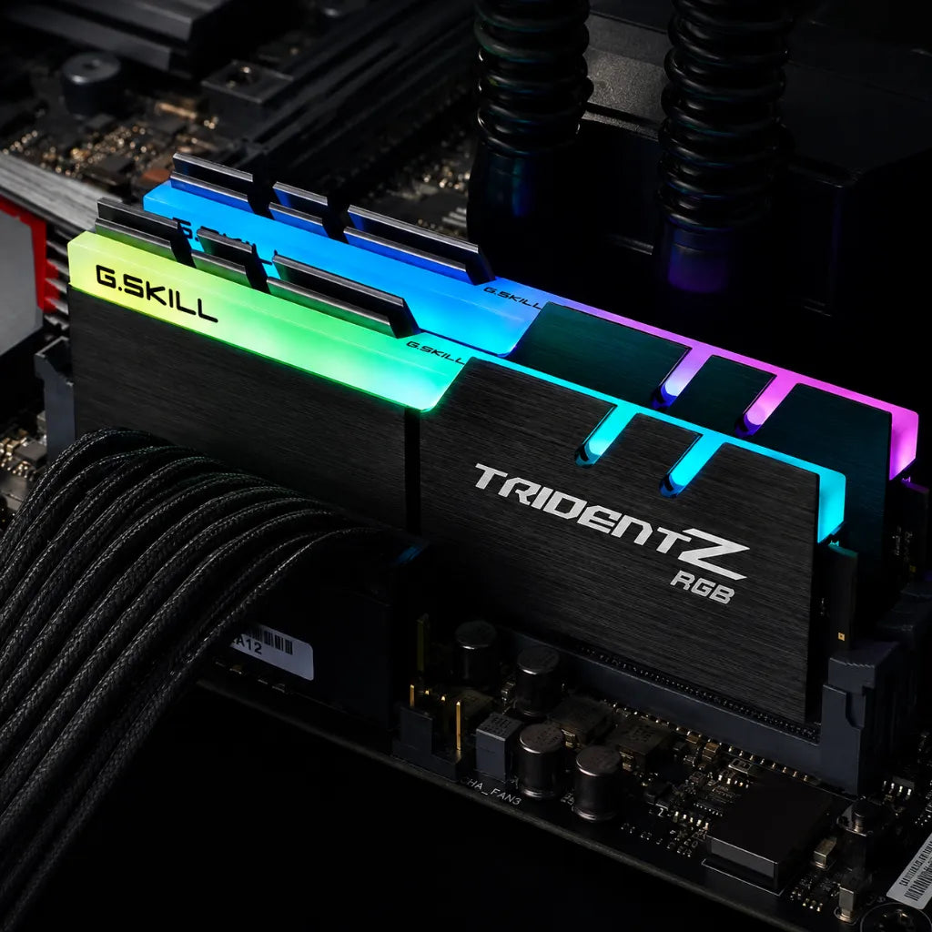 G.SKILL Trident Z RGB 16GB (2x8GB) DDR4 3200MHz desktop RAM installed on a motherboard with customizable RGB lighting for AMD gaming PCs and high-performance desktop builds.