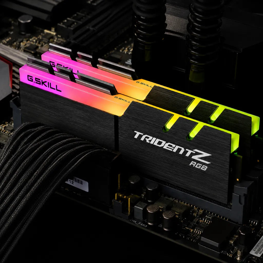 G.SKILL Trident Z RGB 16GB (2x8GB) DDR4 3200MHz desktop RAM installed on a gaming motherboard with customizable RGB lighting for high-performance AMD desktop systems.