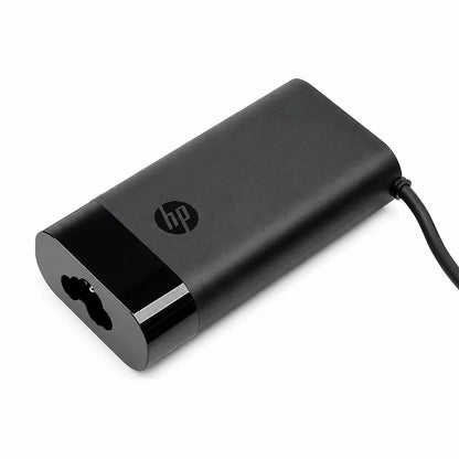 Close-up of HP Original 140W USB Type-C Pin Laptop Charger Adapter body with premium black finish.