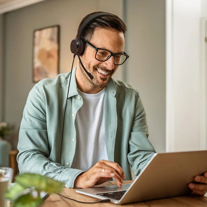 Professional using Jabra Evolve 20 MS stereo wired headset for business calls on a laptop -tpstech.in