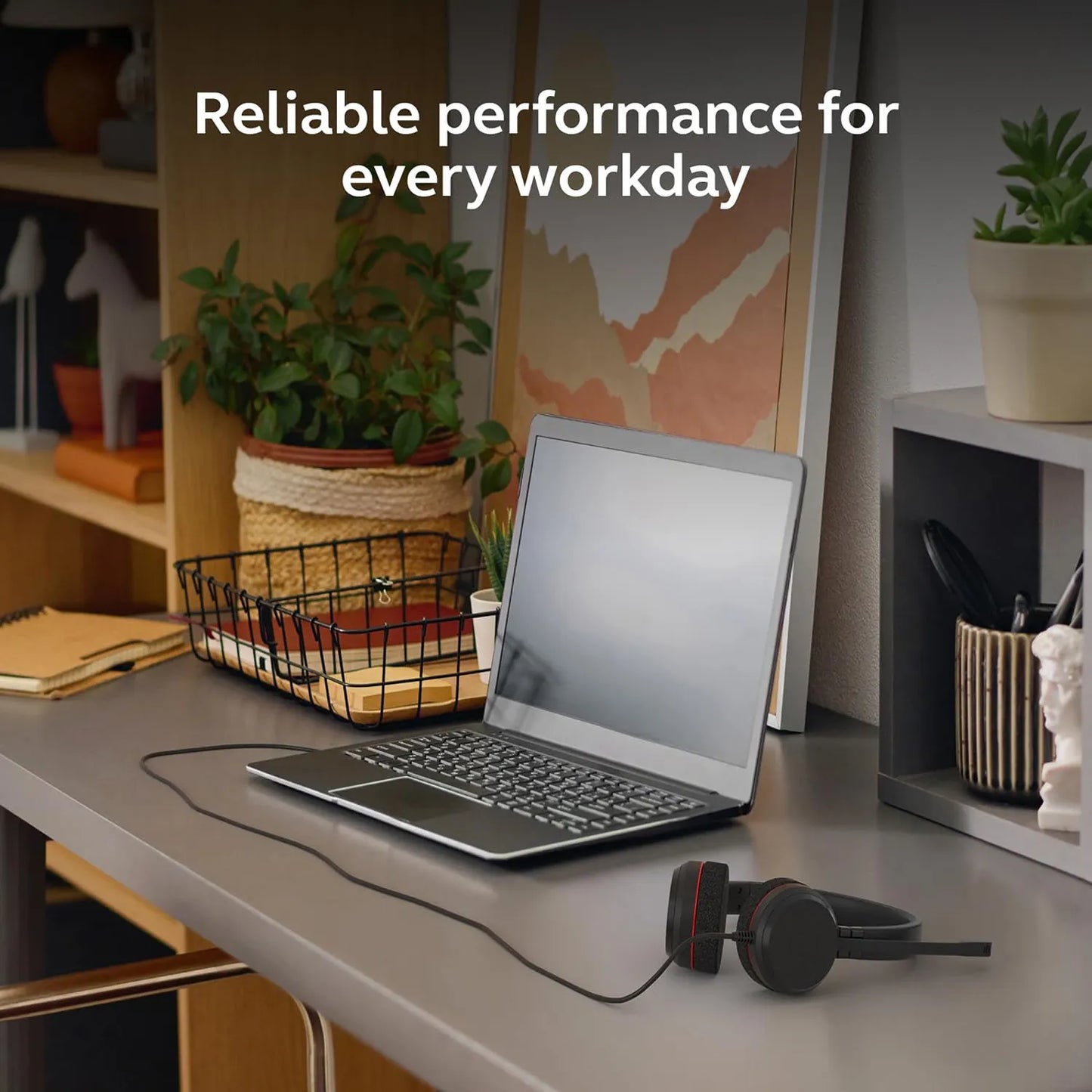 Jabra Evolve 20 MS professional wired stereo headset on an office desk connected to a laptop -tpstech.in