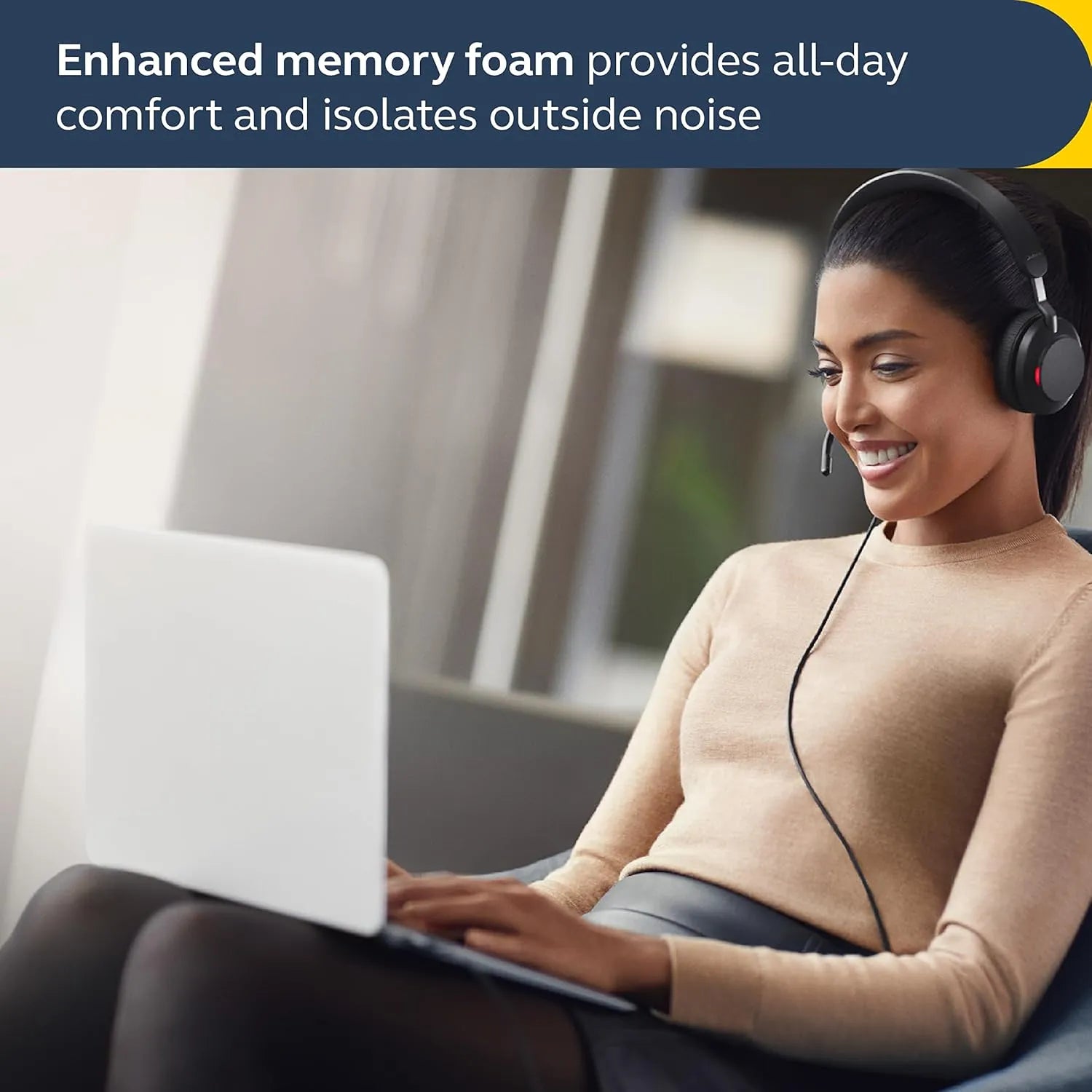 Woman working on laptop wearing Jabra Evolve2 40 SE wired headset with enhanced memory foam ear cushions -tpstech.in
