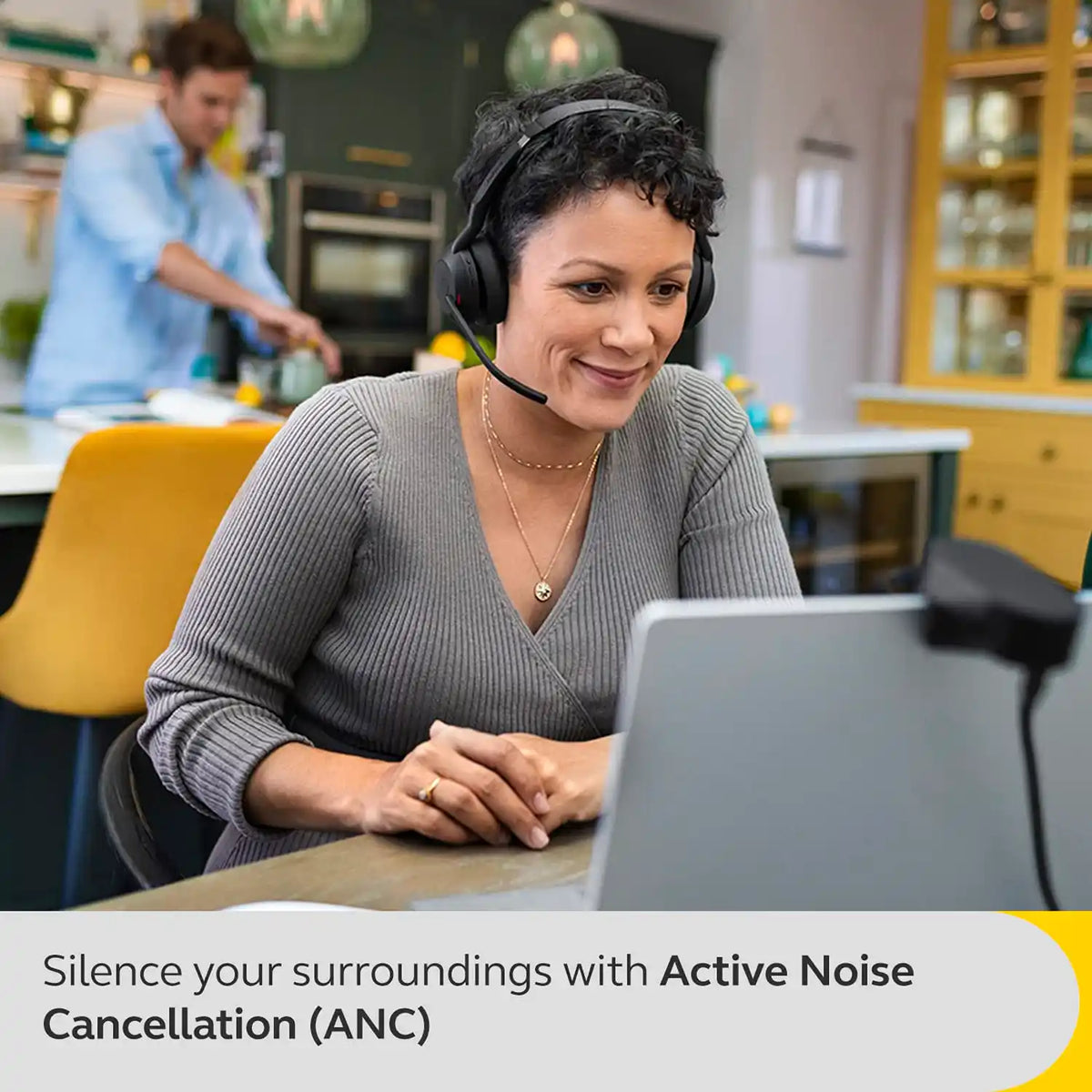 Professional using Jabra Evolve2 55 MS Stereo Headset with Active Noise Cancellation ANC during a virtual meeting -tpstech.in