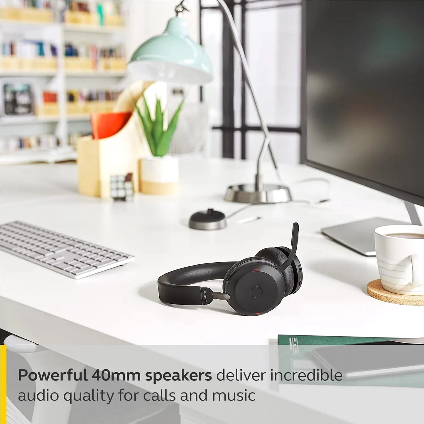 Jabra Evolve2 75 UC Stereo Wireless Headset with powerful 40mm speakers lying on a modern office desk -tpstech.in
