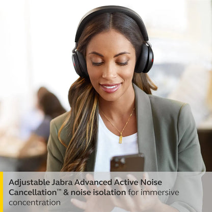 Woman using smartphone while wearing Jabra Evolve2 75 UC Stereo Wireless Headset with Advanced Active Noise Cancellation -tpstech.in
