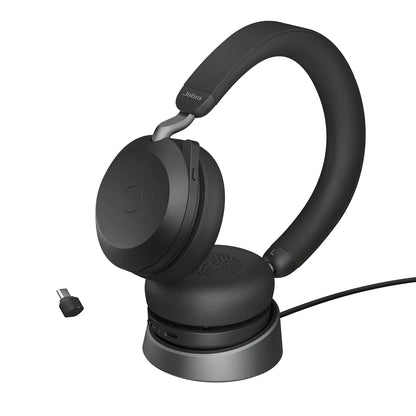Jabra Evolve2 75 UC Stereo Wireless Headset resting on its charging stand with USB C Bluetooth adapter -tpstech.in