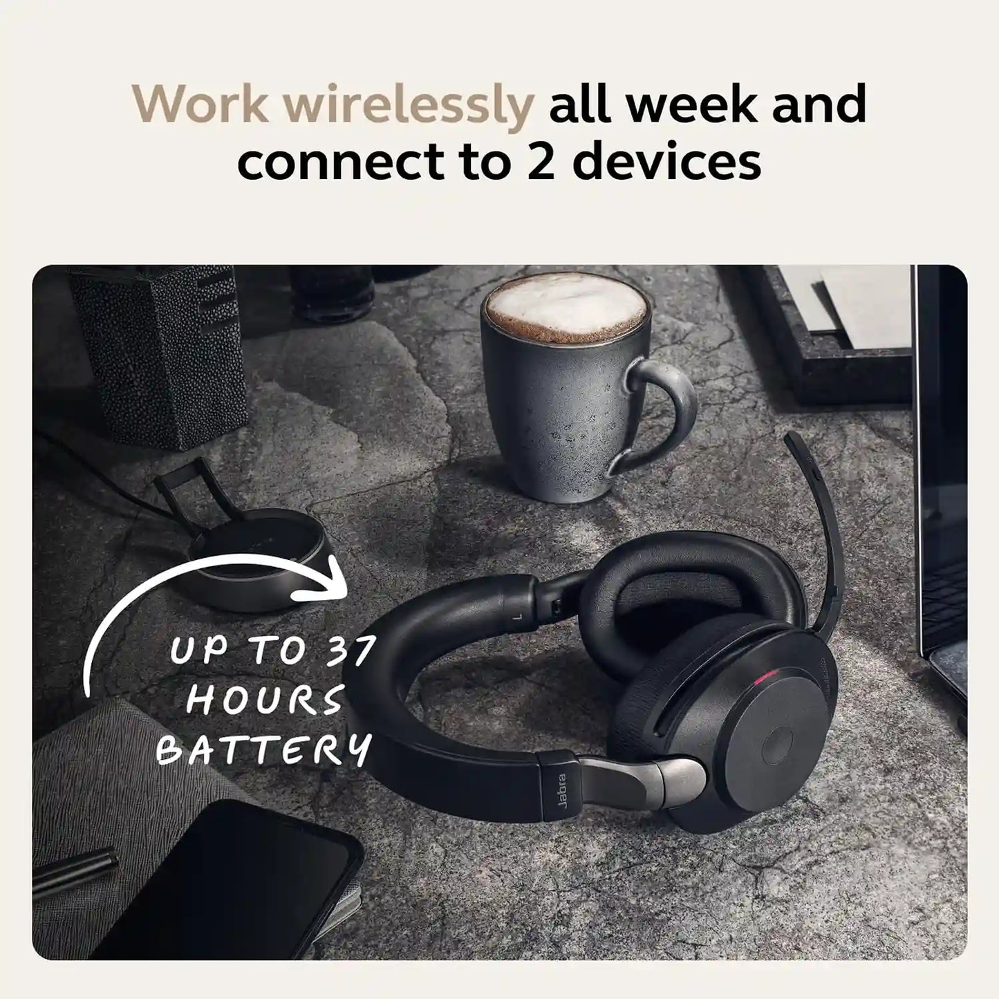 Jabra Evolve2 85 MS Stereo Wireless Headset on desk showing up to 37 hours battery life and charging stand -tpstech.in