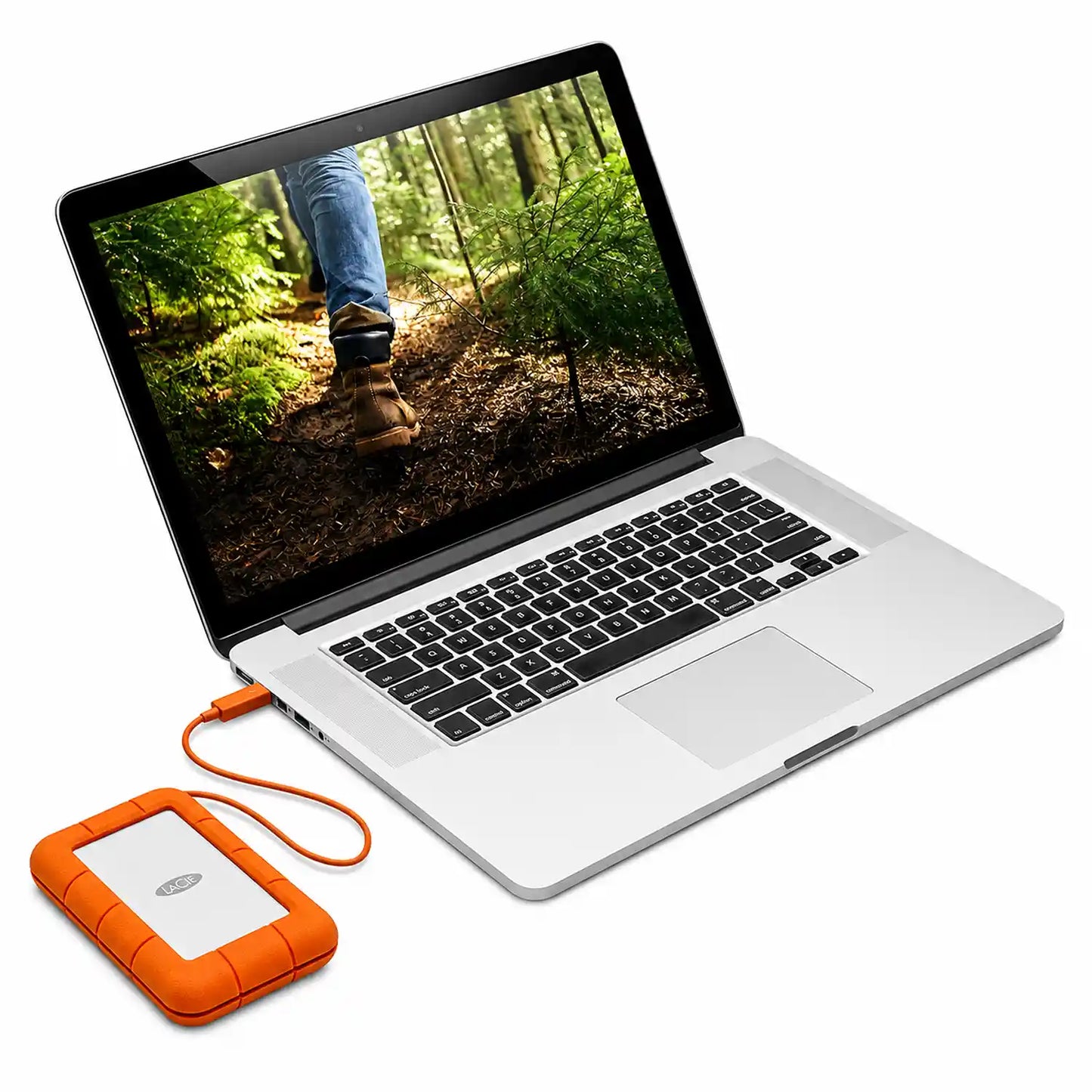 LaCie Rugged 4TB portable external hard drive connected to a MacBook for portable storage-tpstech.in