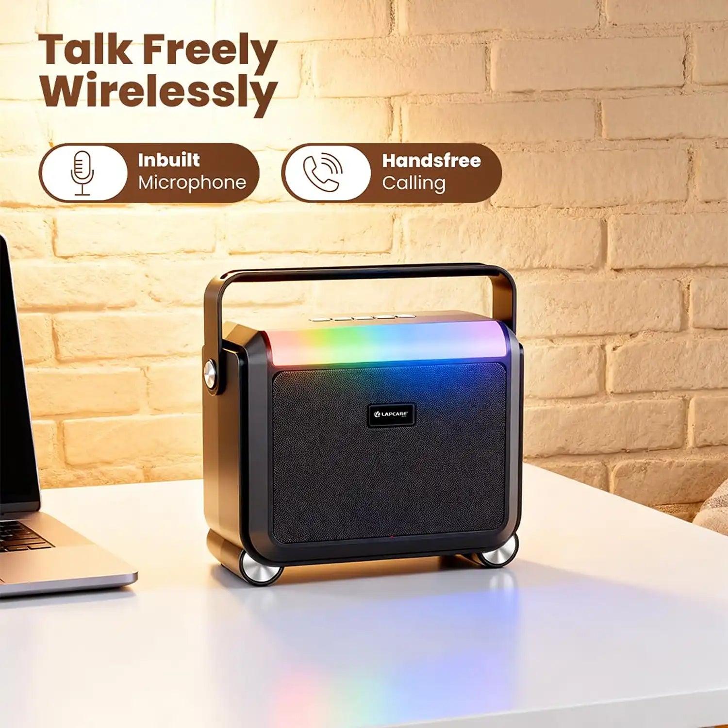 Lapcare Aster 20W Bluetooth speaker with inbuilt microphone for handsfree calling placed beside a laptop -tpstech.in