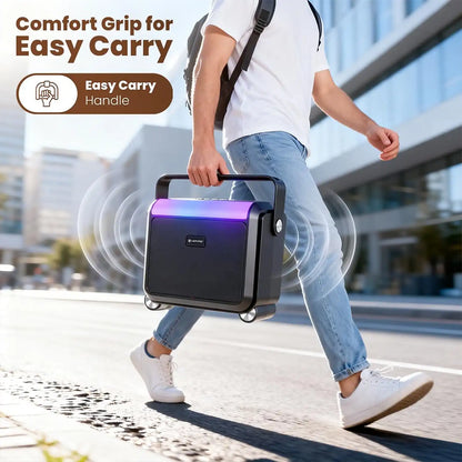 Man carrying Lapcare Aster 20W portable Bluetooth party speaker using the comfort grip handle -tpstech.in