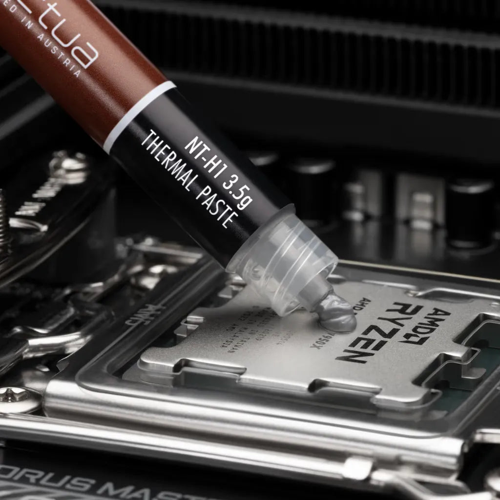 Noctua NT-H1 3.5g AM5 Edition thermal paste applied on AMD Ryzen AM5 processor
