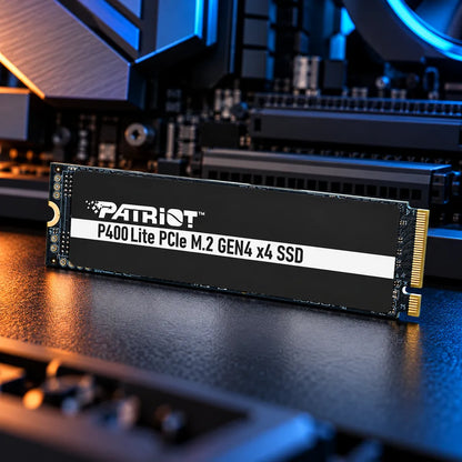 Patriot Memory P400 Lite 1TB PCIe Gen4 NVMe SSD showcased in front of motherboard components with blue ambient lighting -tpstech.in