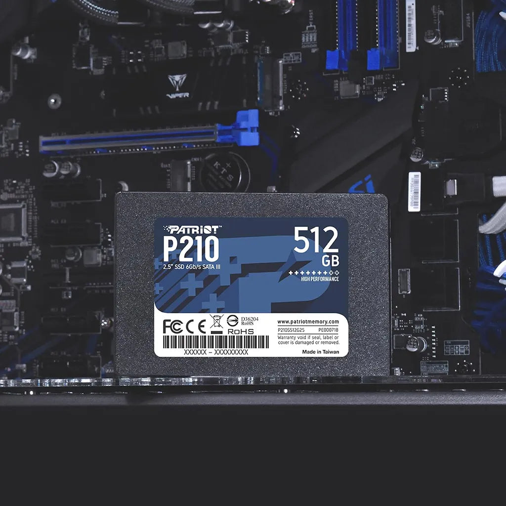 Patriot P210 512GB 2.5 Inch SATA III Internal SSD installed inside custom gaming PC build near motherboard -tpstech.in