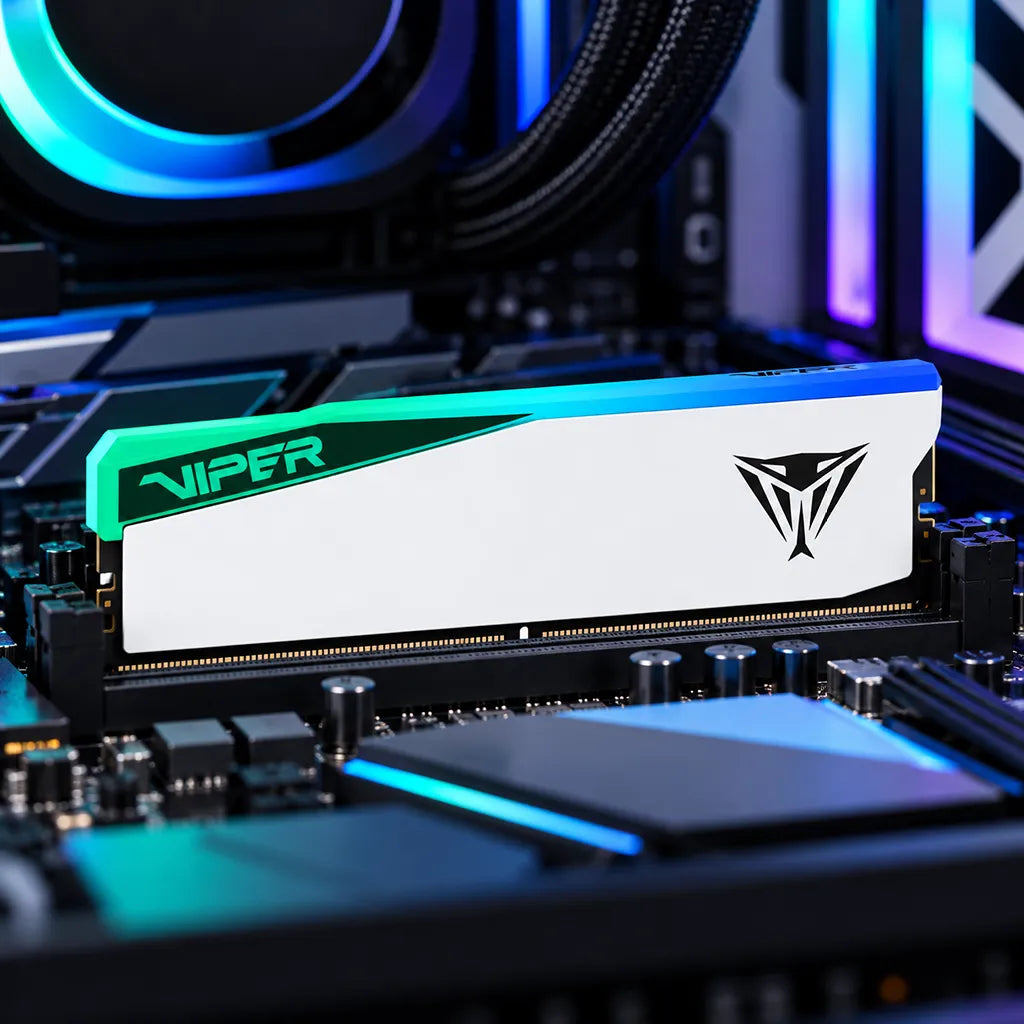 Patriot Viper Elite 5 RGB 16GB DDR5 6000MHz CL30 RAM installed inside gaming PC motherboard slot with glowing ambient lights -tpstech.in