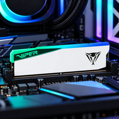 Patriot Viper Elite 5 RGB 16GB DDR5 6000MHz CL30 RAM installed inside gaming PC motherboard slot with glowing ambient lights -tpstech.in