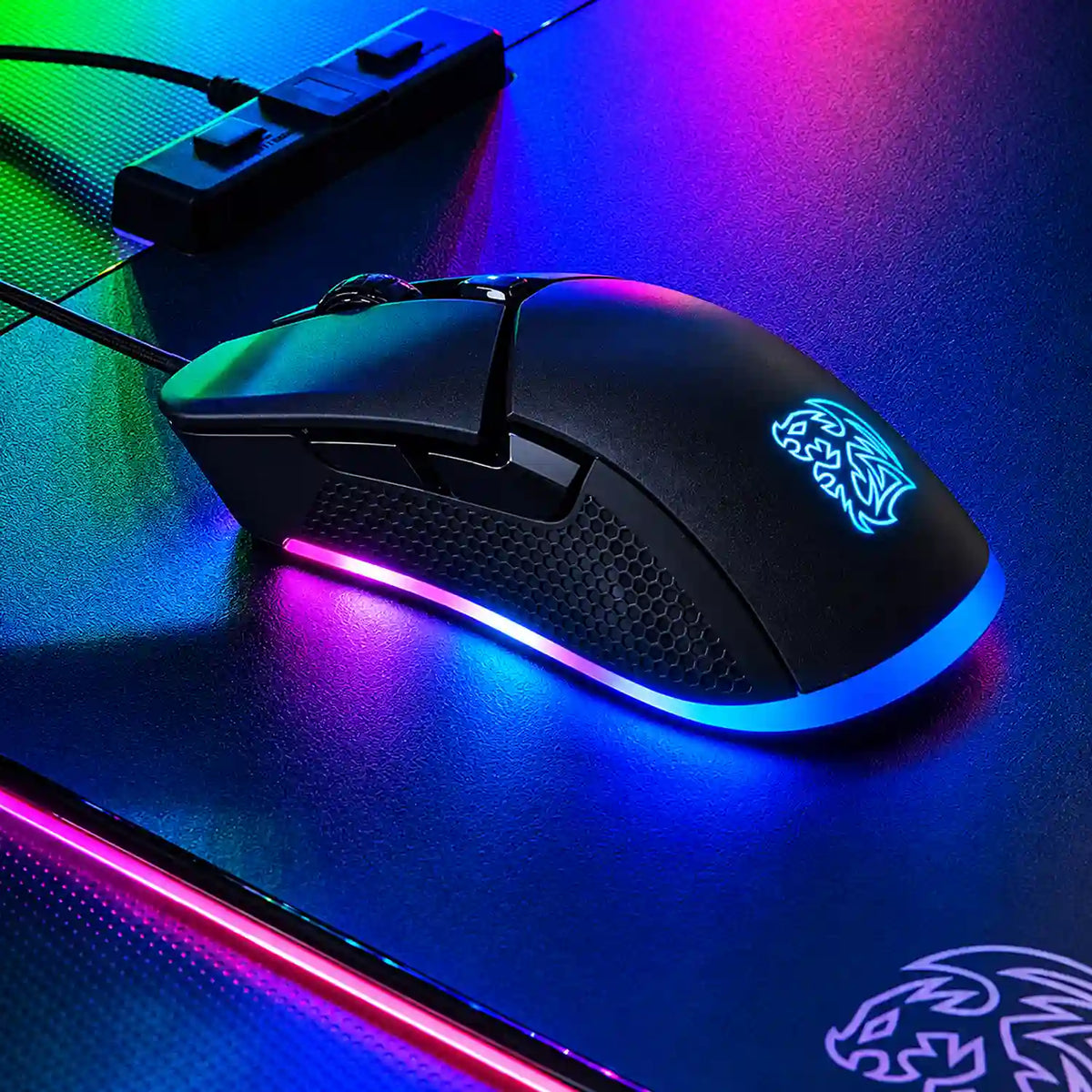 Repacked Thermaltake Tt eSPORTS Iris RGB 5000 DPI Optical Gaming Mouse on desk setup with neon lighting -tpstech.in