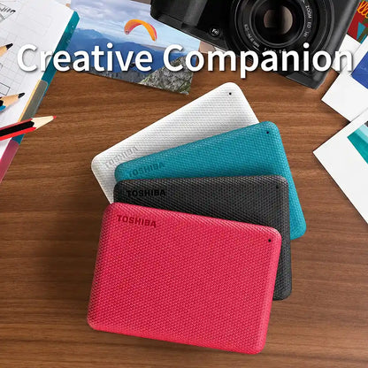 Toshiba Canvio Advance 2TB Portable External Hard Drive lifestyle image showcasing available color options -tpstech.in