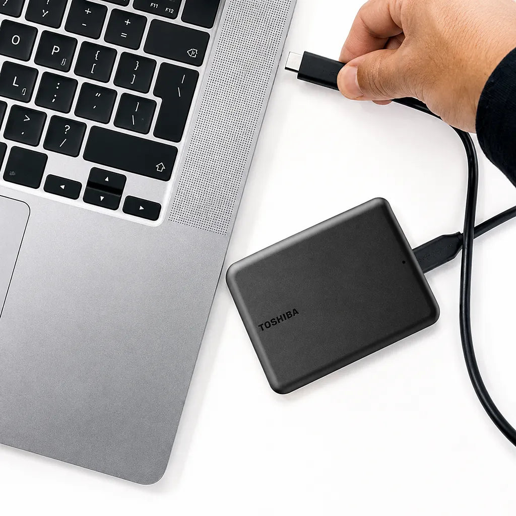 Toshiba Canvio Partner HDTB510AKCAB 1TB external hard drive connected to a laptop using USB-C cable -tpstech.in