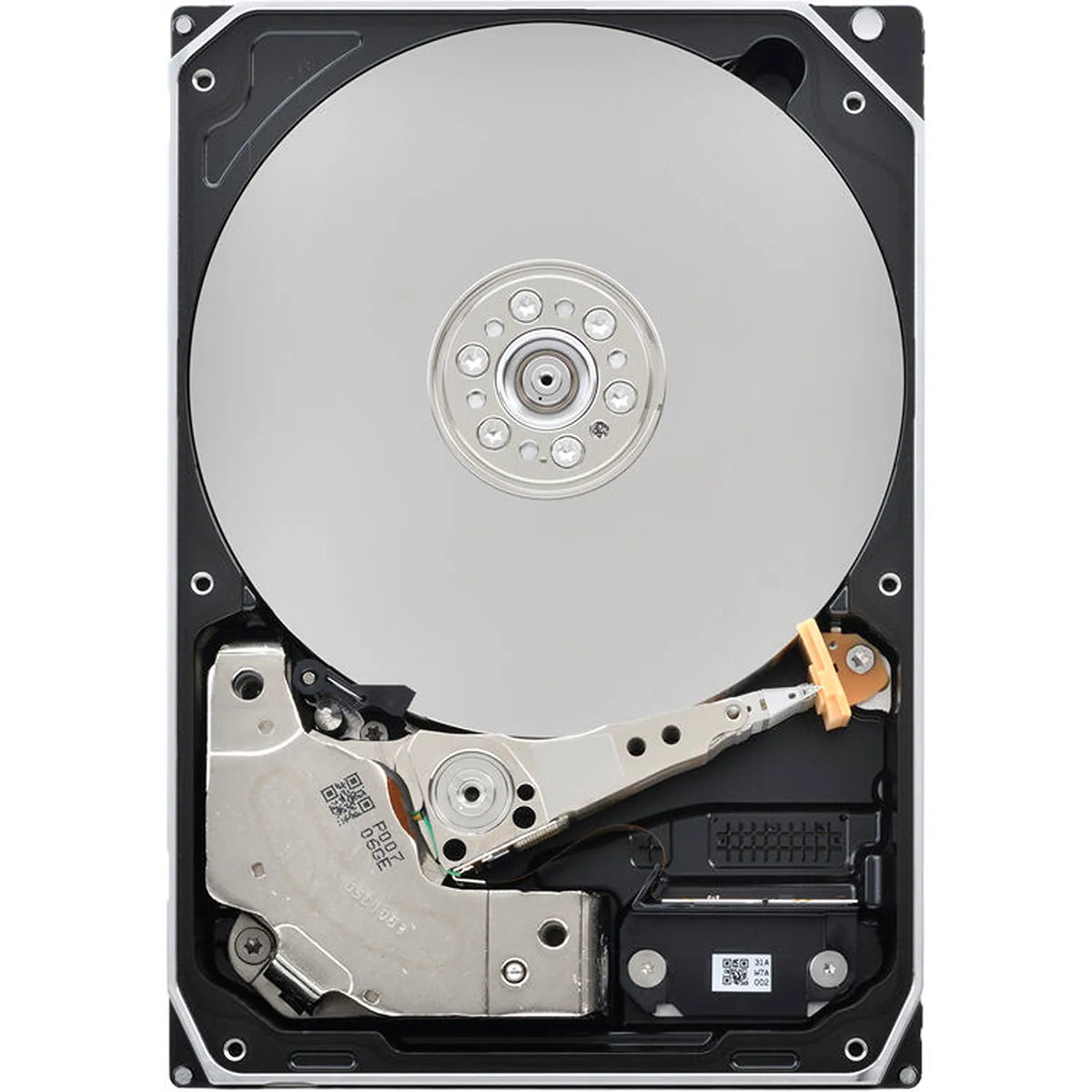 Internal direct view of Toshiba MG11 Series 24TB CMR helium enterprise NAS HDD displaying magnetic platter and read-write head -tpstech.in