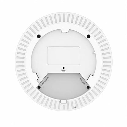Bottom view of TP-Link EAP613 Wi-Fi 6 access point showing mounting interface, reset button and installation design.