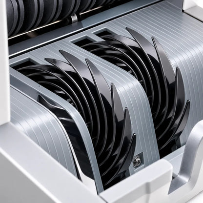 Close-up of the counting wheel mechanism inside the TVS CC 232 Classic cash counting machine.