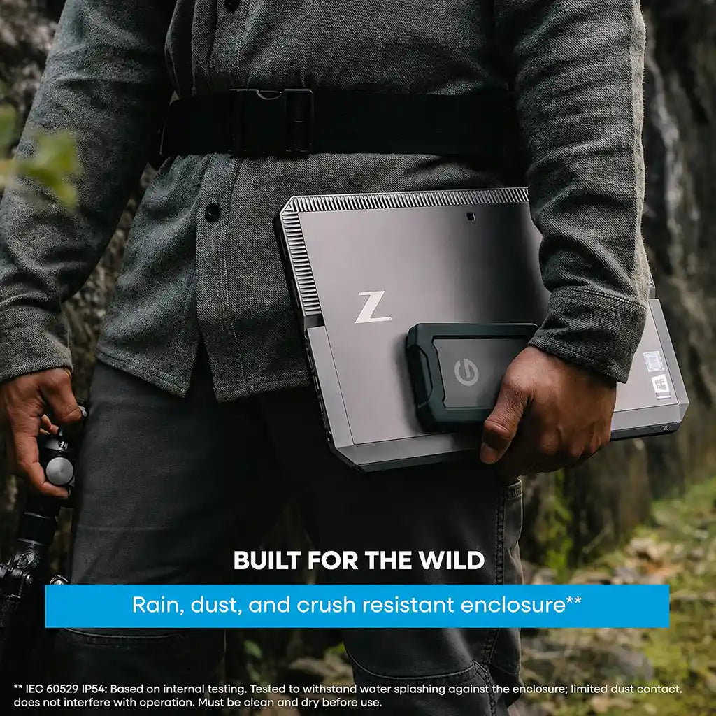 Western Digital G-DRIVE ArmorATD 5TB rugged portable external hard drive with rain, dust and crush resistant design for outdoor use.