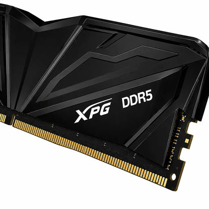 Close-up of XPG ARMAX 16GB DDR5 RAM 5600MHz CL46 desktop memory showing detailed heatsink and gold contacts.