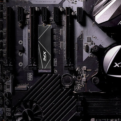 XPG GAMMIX S70 Blade 8TB PCIe Gen4 NVMe M.2 2280 SSD installed on a desktop motherboard M.2 slot.