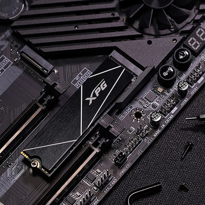 XPG GAMMIX S70 Blade 8TB PCIe Gen4 NVMe M.2 2280 SSD securely mounted in an M.2 slot on a desktop motherboard.