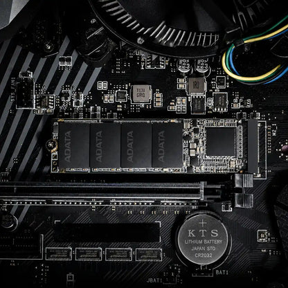 XPG SX6000 Lite 128GB M.2 NVMe PCIe Gen3x4 SSD installed on a desktop motherboard demonstrating M.2 2280 compatibility for PC upgrades -tpstech.in